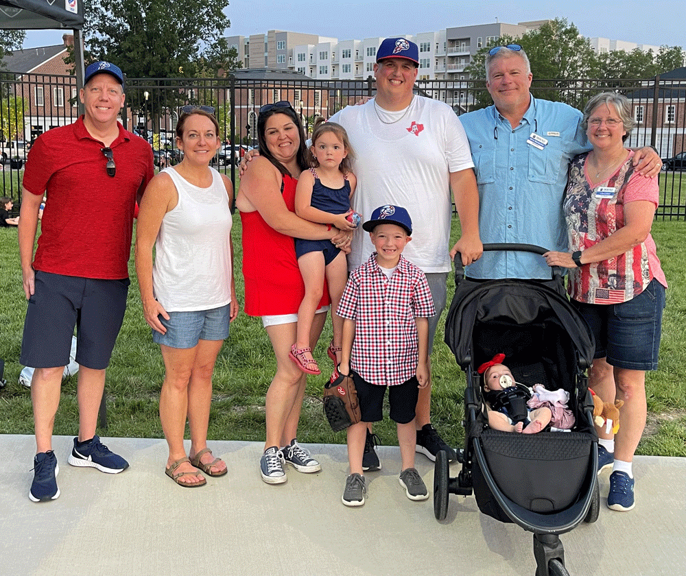 Board members Gary, Jennifer, Steve, and Lisa with the Lewis Family, who won the 50/50 Raffle